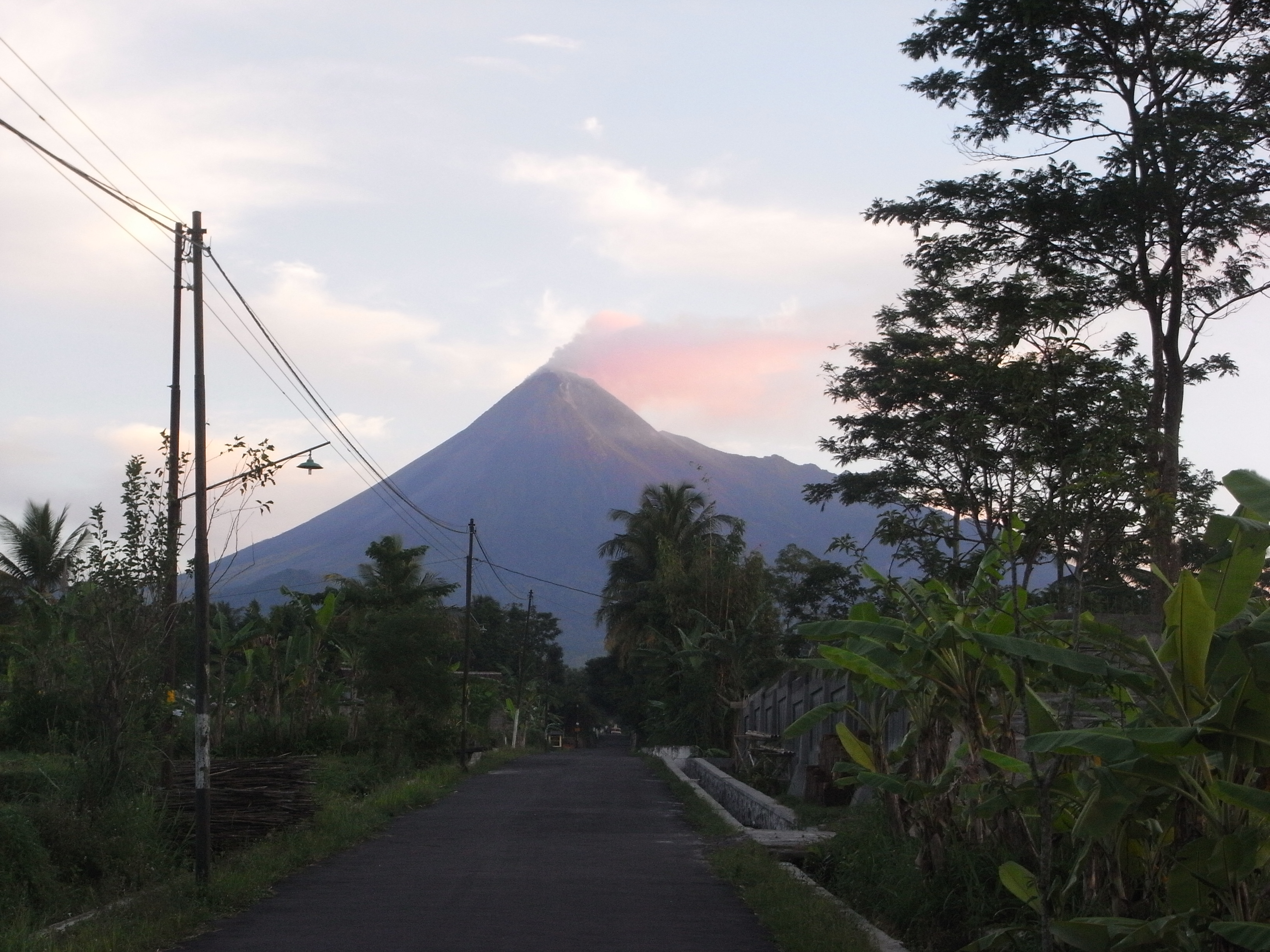 Active volcano Gunung Merapi as seen from the road in front of Kartika's house.