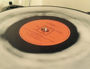 Cleaning a vinyl LP: Wet PVA glue on the record surface